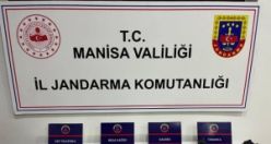 Ruhsatsız silah ve uyuşturucu hap ele geçirildi