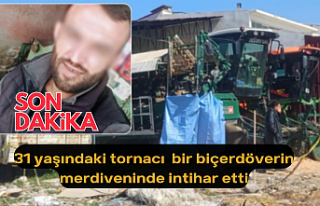 31 yaşındaki tornacı  bir biçerdöverin merdiveninde...